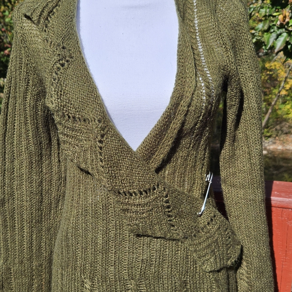 Criss-cross sweater Olive colored. Size Small Has side tie & pin.